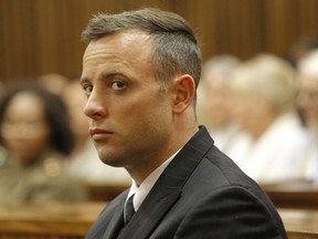 Oscar Pistorius is seen inside the dock at the high court in Pretoria for his sentencing hearing at the high court in Pretoria on June 14, 2016 in Pretoria, South Africa.