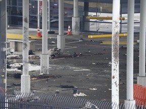 Debris is scattered about inside the customs plaza at the Rainbow Bridge border crossing, Wednesday, Nov. 22, 2023, in Niagara Falls, N.Y. The border crossing between the U.S. and Canada has been closed after a vehicle exploded at a checkpoint on a bridge near Niagara Falls.