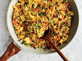 Garlicky fried rice with peas and bacon. Photo by Renee Kohlman.