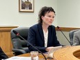 Saskatchewan provincial auditor Tara Clemett outlines a report at a news conference at the Saskatchewan Legislature, in Regina on Tuesday, June 6, 2023. She is to investigate how the province chooses hotels for those who require social assistance.