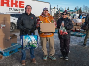 Staff and volunteers with Prince Albert Grand Council distribute 3,500 Christmas food hampers in December 2023.