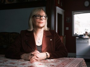 Jo-Anne Dusel, executive director of the Provincial Association of Transition Houses and Services of Saskatchewan, poses for a photo at her home in Moose Jaw, Sask., on Thursday, Feb. 25, 2021.