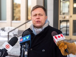 REGINA, SASK. -- JANUARY 10/2024- Bennett Jensen, legal director at LGBTQ+ lobby group Egale Canada, speaks to members of the media outside of the Court of King's Bench regarding legal action against Saskatchewan Government's pronoun consent policy in Regina on Wednesday, January 10, 2024. (Regina Leader-Post/Heywood Yu)