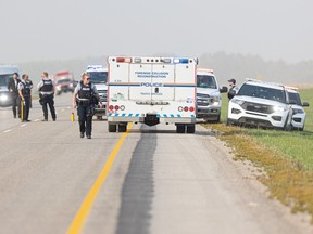 RCMP on Highway 11 after the arrest of Myles Sanderson north of Saskatoon on Wednesday, Sept. 6, 2022.