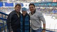 Dave Repsher, from left, his wife Amanda Repsher and Marty Richardson with Dawg Nation attend a Saskatoon Blades hockey game at SaskTel Centre in Saskatoon, Feb. 23, 2024. (Michelle Berg / Saskatoon StarPhoenix)