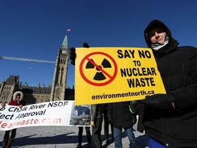 Demonstrators rally on the front lawn on Parliament Hill against a proposed nuclear waste dump at Chalk River on February 14, 2024 in Ottawa, Canada.