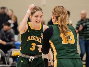 University of Regina women's basketball player Dayne Pearce celebrates with a teammate during a Canada West victory on Feb. 10/24. Photo by Shaira Castillo/University of Regina Athletics