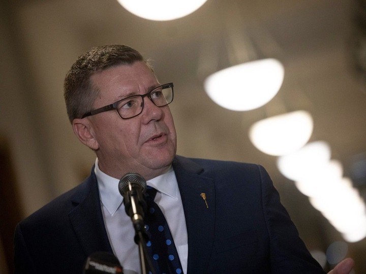  Premier Scott Moe answers questions from the press after question period inside the legislature on Thursday, November 23, 2023 in Regina.