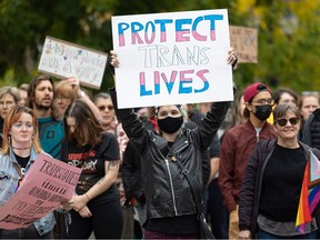 Protesters over Saskatchewan school policies on gender identity take to the streets in downtown Saskatoon, Sask. on Wednesday, Sept. 20, 2023.