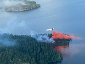 Global warming and a growing population are changing the face of the north, and the rest of the country must wake up and defend the land and way of life that defines Canada, says Doug Cuthand. PIctured is a Saskatchewan Public Safety Agency plane fighting a fire in northern Saskatchewan.