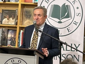 Eric Cline speaks to attendees at a book launch event on March 27, 2024 in Saskatoon.