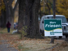Provincial election signs are posted in the Riversdale neighbourhood in Saskatoon in October of 2020.
