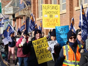Members of the Saskatchewan Union of Nurses take to the streets to raise awareness of health-care system crisis