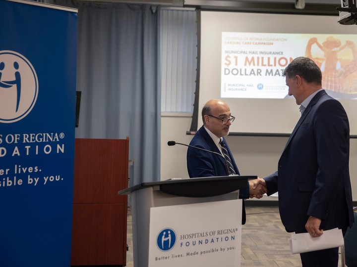 (L-R) Dino Sophocleous, president and CEO of the Hospitals of Regina Foundation, shakes hands with Rodney Schoettler, CEO of Municipal Hail, during an announcement on Tuesday to improve care available to cardiac patients from across southern Saskatchewan at Regina General Hospital.