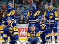 Saskatoon Blades forward Easton Armstrong (27) and team react after losing to Moose Jaw Warriors in overtime in game 7 at SaskTel Centre. Photo taken in Saskatoon, Sask. on Tuesday, May 7, 2024.