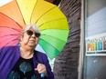 Mirtha Rivera, one of two chairs of Queen City Pride, stands for a portrait outside the QC Pride offices on Monday, May 13, 2024 in Regina.