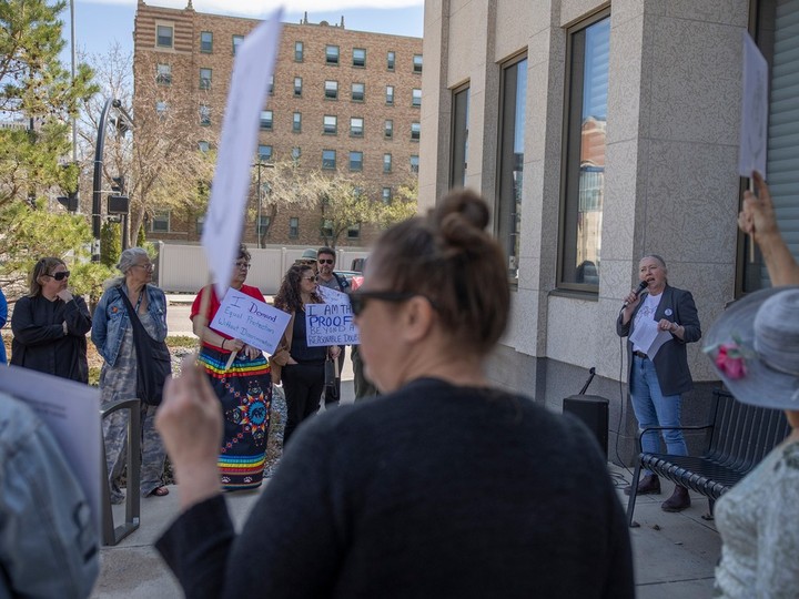  Lisa Miller, executive director of the Regina Sexual Assault Centre, speaks to the crowd during a demonstration to show solidarity for survivors of sexualized violence in Saskatchewan at the Court of King’s Bench on Wednesday, May 8, 2024 in Regina.