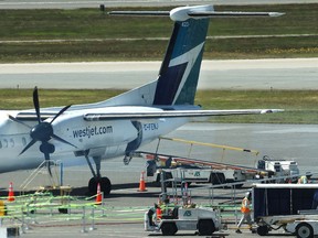 Scenes from Vancouver International Airport (YVR) as WestJet Maintenance and Tech OPs employees work on a plane in Richmond, B.C., on June 20, 2024.