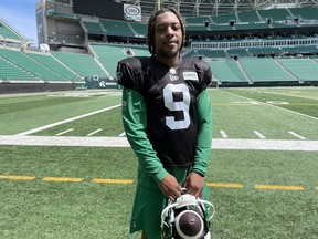 Saskatchewan Roughriders quarterback Eric Barriere poses for a photo following his first practice with the team on June 30, 2024 at Mosaic Stadium.