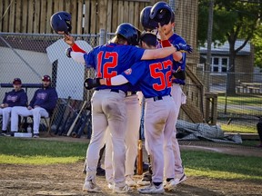 The Regina Red Sox celebrate during a game against the Weyburn Beavers during the 2024 Western Canadian Baseball League season.
