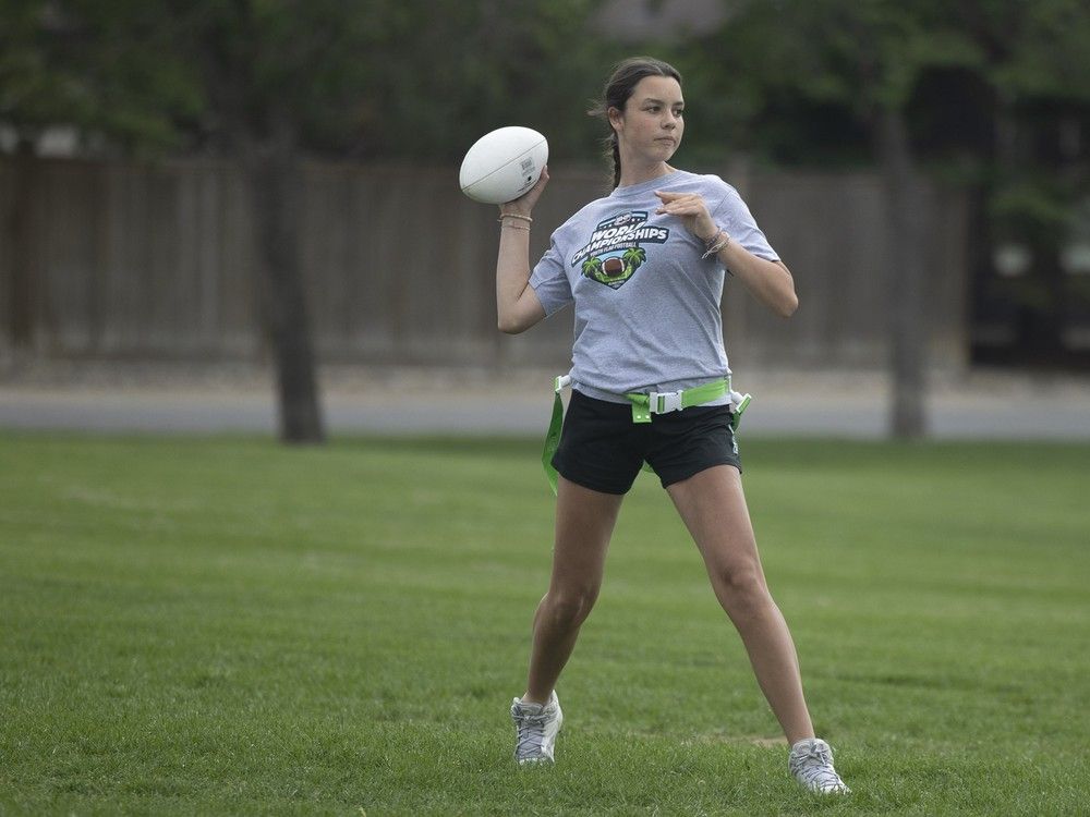 Quarterback Adley Tomlenovich from the Saskatchewan-based girls 15U flag football team practices at Ecole Wilfrid Walker School on Wednesday, July 3, 2024 in Regina.