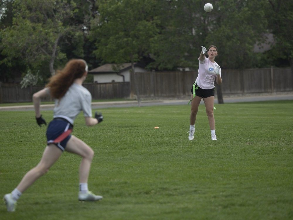 Backup quarterback Cameron Scott from the Saskatchewan-based girls 15U flag football team practices at Ecole Wilfrid Walker School on Wednesday, July 3, 2024 in Regina.