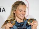 Politics tamfitronics CP-Web. Canada's Summer McIntosh of Toronto poses with her four medals won in the pool at the 2024 Summer Olympics, Monday, Aug. 5, 2024 in Paris, France. The three gold medals were for the 200m Butterfly, the 200m Individual Medley and the 400m Individual Medley and the one silver was for the 400m Freestyle.
