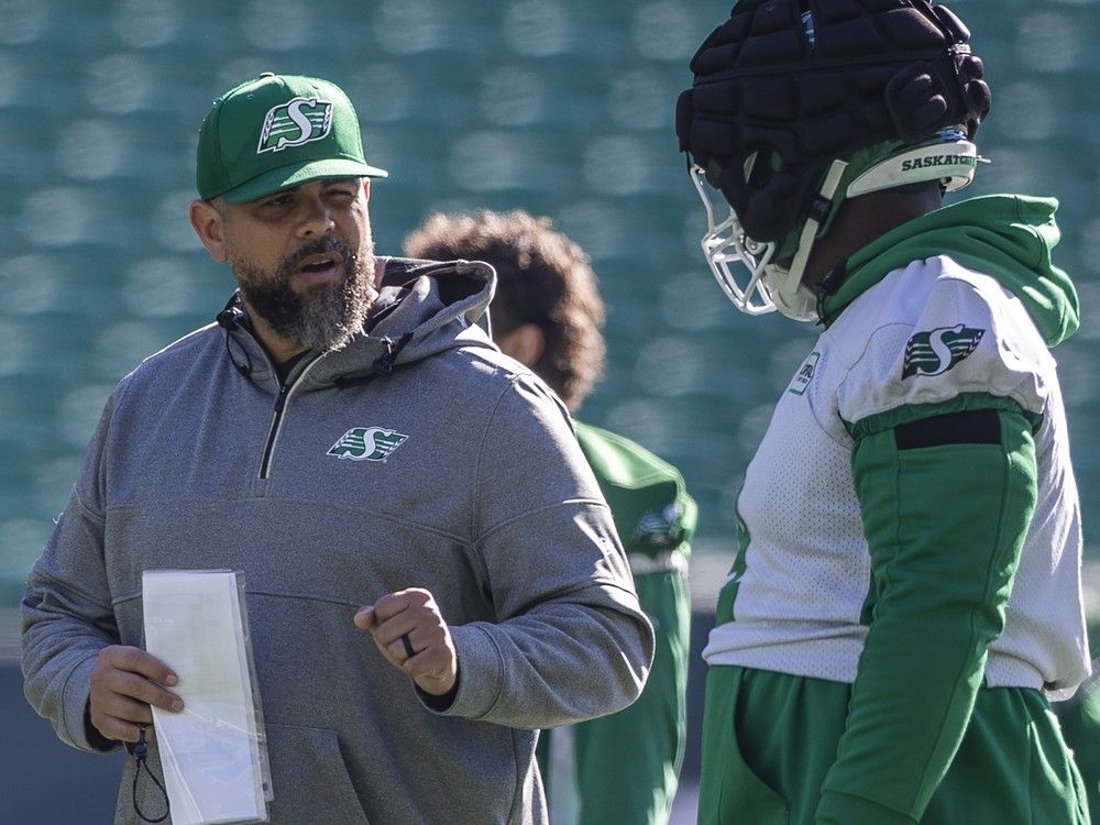 Regina, Sask.: October 8, 2024. Saskatchewan Rogeriders head coach Corey Mace speaks to a player during practice at Mosaic Stadium Tuesday, Oct. 8, 2024, in Regina. Cale Nace / Regina
