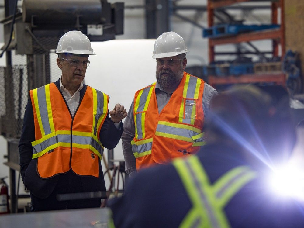  liberal leadership candidate mark carney receives a tour inside pro metal industries ltd by ceo mark brown on tuesday feb. 11, 2025 in regina. kayle neis / regina leader-post