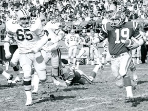 Steve Molnar, 19, carries the ball for the Saskatchewan Roughriders against the Edmonton Eskimos in the 1970s.