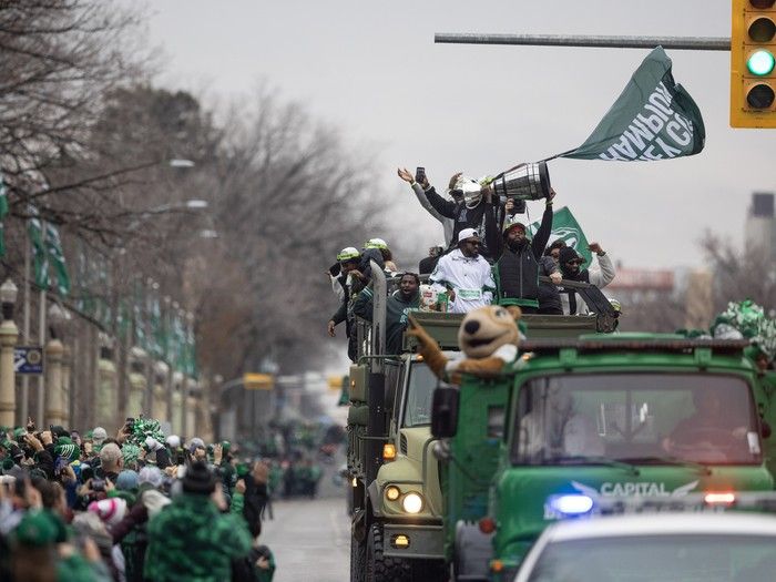Thousands of Roughrider fans lined Regina's Albert Street on Tuesday afternoon as the Grey Cup trophy was paraded across the city.