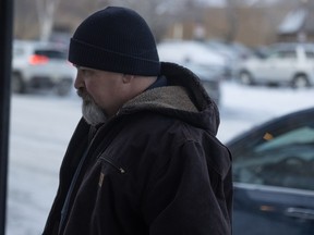 Former Regina Police Service officer Robert Eric Semenchuck walks into Regina provincial court on Friday, Jan. 23, 2026 in Regina.