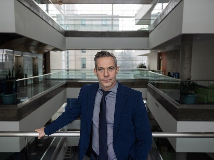 Associate professor in international studies at the U of R and CIPHER lead Brian McQuinn stands for a portrait inside the U of R campu