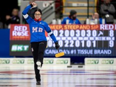 Manitoba skip Kerri Einarson celebrates her comeback win over fellow Manitoban Kate Cameron during Scotties Tournament of Hearts action in Thunder Bay, Ont., Tuesday, Feb. 18, 2025.