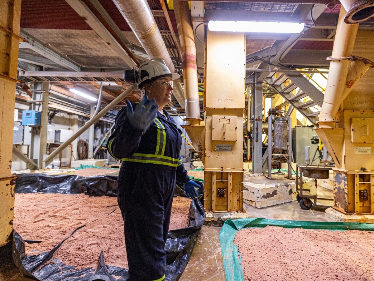 Courtney Rohachuk, pilot plant manager, gives a tour of the Nutrien Pilot Plant, a technical facility that tests new technologies. The tests take place in a "mock" mine, simulating how the equipment would work underground.