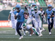 Toronto Argonauts receiver Janarion Grant (3) runs the football against the Saskatchewan Roughriders during the first half of CFL football action at Mosaic Stadium in Regina, on Friday, June 26, 2026.