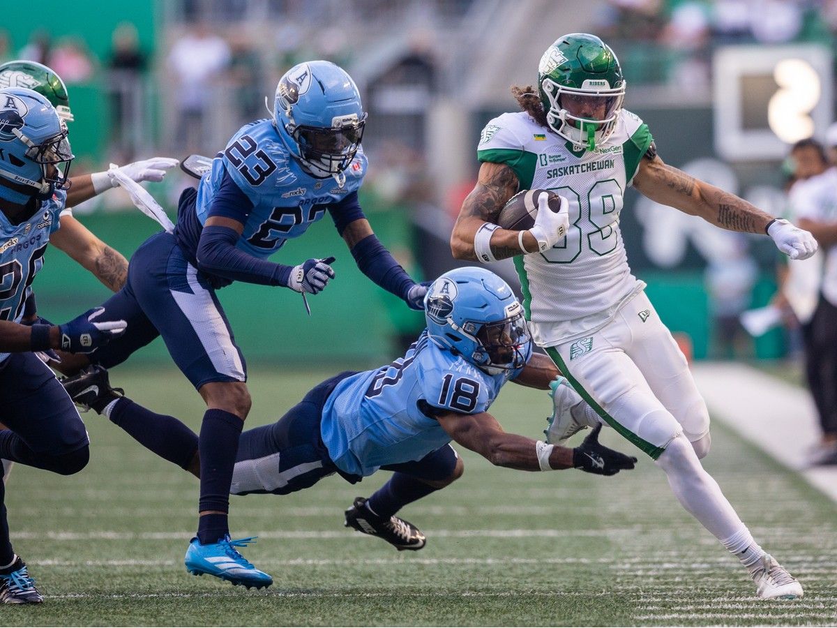 Saskatchewan Roughriders receiver Kian Schaffer-Baker (89) runs the football against the Toronto Argonauts during the first half of CFL football action at Mosaic Stadium in Regina, on Friday, June 26, 2026.
