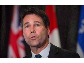 Ontario Health Minister Eric Hoskins speaks during a news conference after the first day of a meeting of provincial and territorial health ministers in Vancouver, B.C., on January 20, 2016. Hoskins has announced he is resigning from his post.