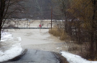 Colin Street (parallel with Rush Creek) in Port Bruce is flooded from rain and melting snow  on Tuesday February 20, 2018. Derek Ruttan/The London Free Press/Postmedia Network