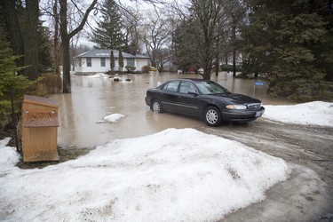 A home on Dexter Line in Port Bruce is flooded from rain and melting snow  on Tuesday February 20, 2018. Derek Ruttan/The London Free Press/Postmedia Network