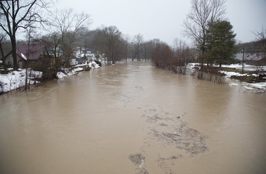 Rush Creek in Port Bruce, Ontario is bloated due to  rain and melting snow  on Tuesday February 20, 2018. Derek Ruttan/The London Free Press/Postmedia Network