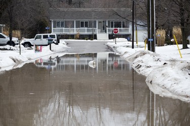 Lindley Street in Port Bruce is flooded from rain and melting snow  on Tuesday February 20, 2018. Derek Ruttan/The London Free Press/Postmedia Network