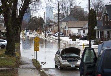 A van has electrical issues on Wyatt Street near Wharncliffe and Riverside as several roads in the area were closed due to flooding. Photograph taken on Wednesday February 21, 2018.  Mike Hensen/The London Free Press/Postmedia Network