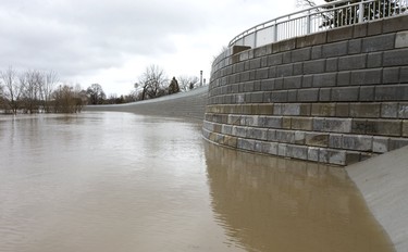 The new Phase 3 of the retaining wall that runs north towards the Blackfriar's bridge location was installed in the past year and is shown holding back high flood waters from the west London (Blackfriars area) in London, Ont.  Photograph taken on Wednesday February 21, 2018.  Mike Hensen/The London Free Press/Postmedia Network