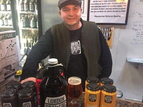 Jeff Pastorius, one of the founders of London Brewing Co-Op, shows off some of his work at the brewery. The east London business is one of 33 in Southwestern Ontario to share $2.1 million in government money to grow their businesses. (NORMAN, DE BONO, The London Free Press)