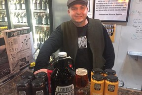 Jeff Pastorius, one of the founders of London Brewing Co-Op, shows off some of his work at the brewery. The east London business is one of 33 in Southwestern Ontario to share $2.1 million in government money to grow their businesses. (NORMAN, DE BONO, The London Free Press)