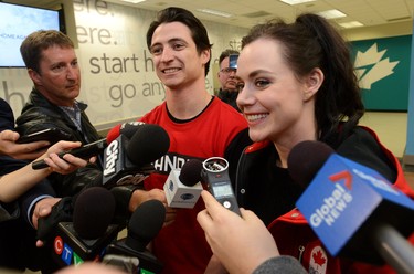 Scott Moir and Tessa Virtue speak with reporters after arriving at London International Airport on Monday February 26, 2018 back from the Olympic games where they won gold in the ice dance MORRIS LAMONT/THE LONDON FREE PRESS /POSTMEDIA NETWORK