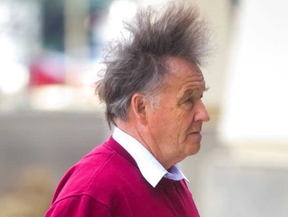 Retired Anglican priest David Norton enters the London courthouse. (MIKE HENSEN, The London Free Press)