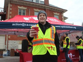 Volunteer Shawn Hewitt spent Saturday evening giving out warm drinks and treats to participants in the Coldest Night of the Year fundraiser for Mission Services London. (DALE CARRUTHERS, The London Free Press)