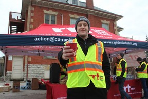 Volunteer Shawn Hewitt spent Saturday evening giving out warm drinks and treats to participants in the Coldest Night of the Year fundraiser for Mission Services London. (DALE CARRUTHERS, The London Free Press)